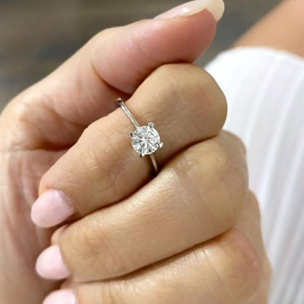 Circle solitaire ring discount