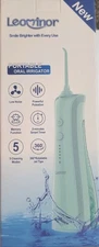 Two Green Waterproof Leominor Portable Oral Irrigators