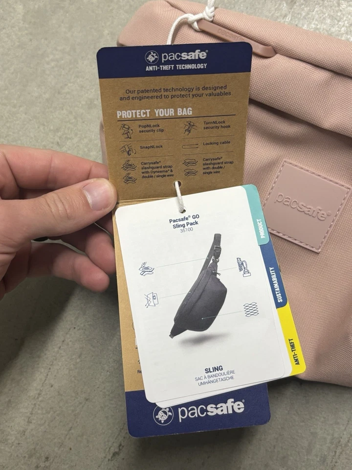 Paquete de eslinga antirrobo Pacsafe GO rosa Foto 2 de 4