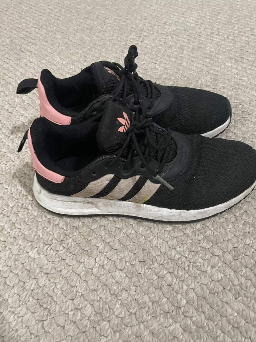 Black adidas shoes with pink stripes 2025