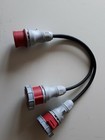 16amp 3-phase (5-pin ) plug to twin 16amp sockets.