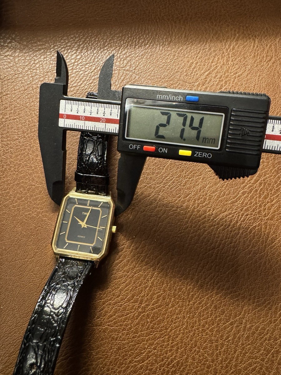 Vintage Timex T92 Tank Style Gold Tone Black Dial Quartz Watch