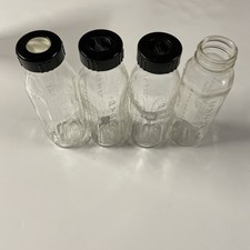 Vintage Evenflo 8 Oz Glass Baby Bottles.