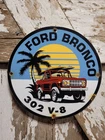 VINTAGE FORD BRONCO PORCELAIN SIGN OLD 302 V-8 SPORT TRUCK MUSCLE CAR 1973 12"