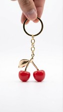   Cute light red cherry keychain keyring, elegant gold-tone bag charm accessory