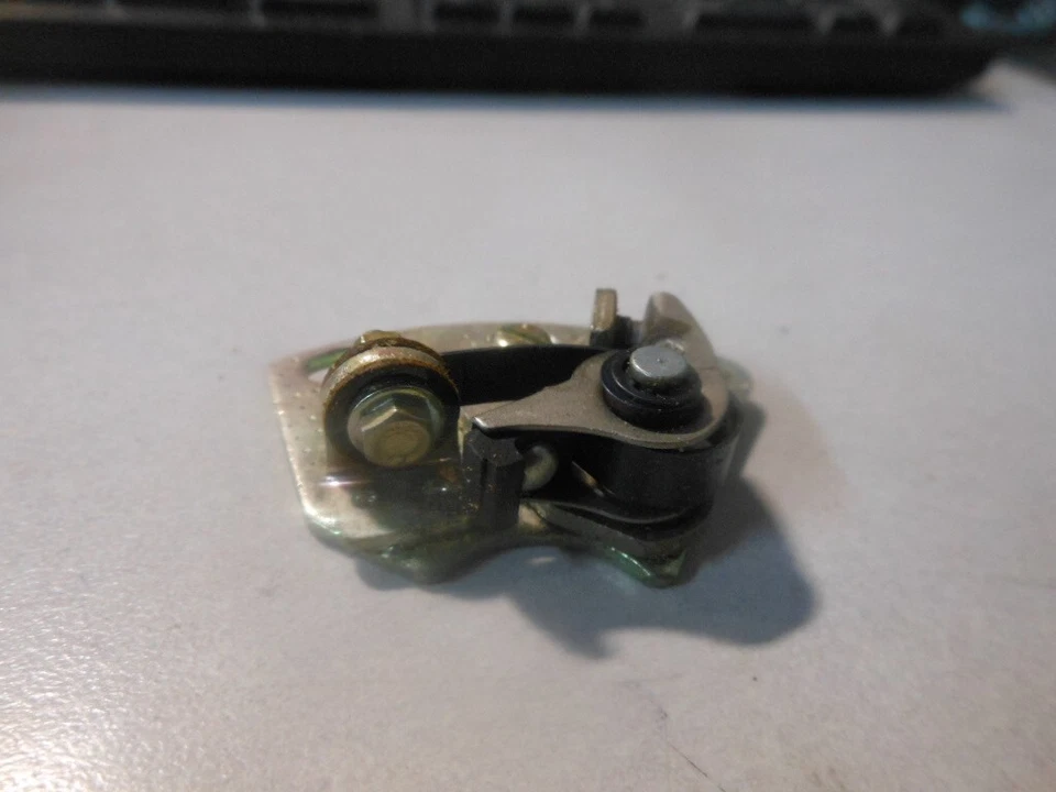 Conjunto de punto de contacto izquierdo NOS Suzuki T20 TC250 31460-11010 Foto 3 de 4