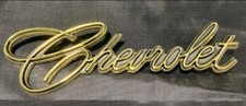 1969-1976 Chevy Impala Trunk Emblem Gold. Bin 22