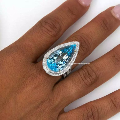 24.25CT Ocean Blue Pear Cut Topaz With Sparkling 1.26CT White CZ Engagement Ring