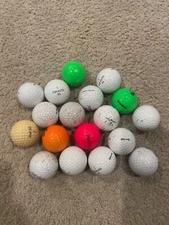 used golf balls 18 count multiple colors and brands. Some in great condition 