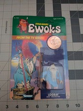 Star Wars Kenner 1985 Ewoks Logray Action Figure w Coin Clear Bubble