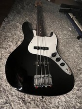 Fretless Fender Squier Jazz Bass Black and White With Flatwound Strings