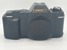CANON T50 CAMERA BODY FOR PARTS CORRODED BATTERIES AND STUCK SHUTTER