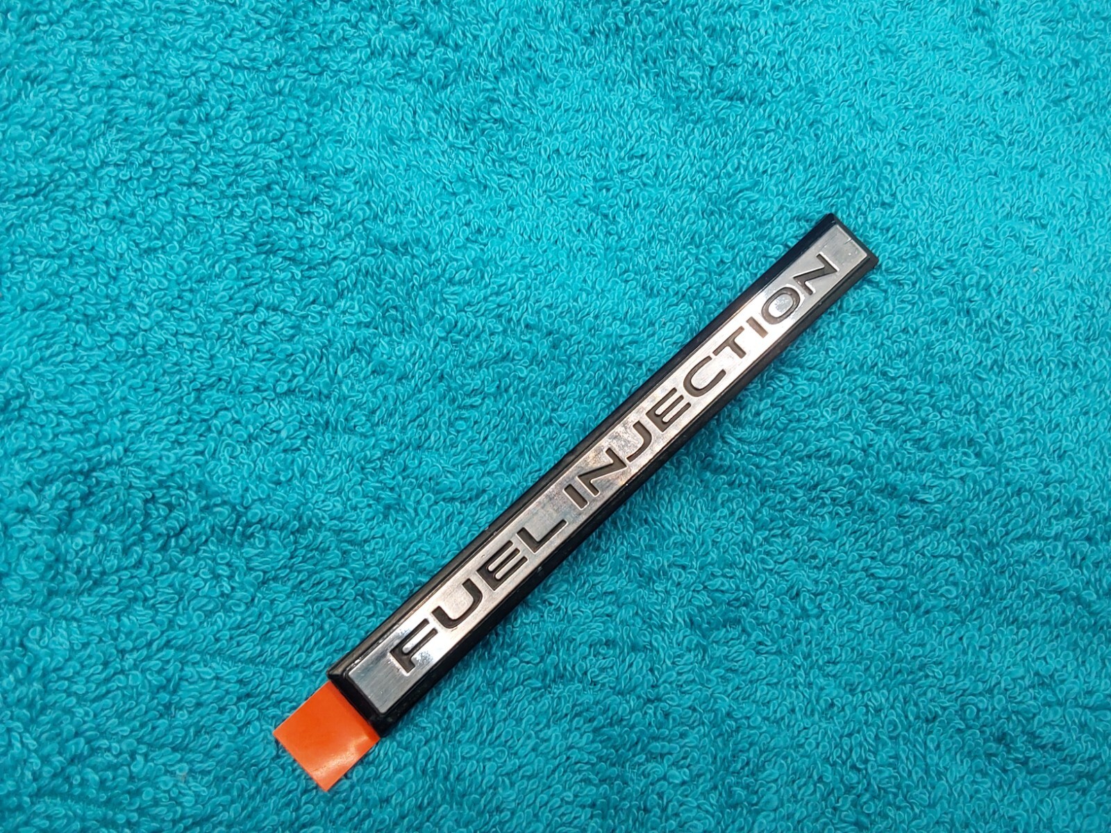 NOS GM 1987 CHEVY GMC 4X4 TRUCK FUEL INJECTION TAIL GATE EMBLEM ORNAMENT NEW 87