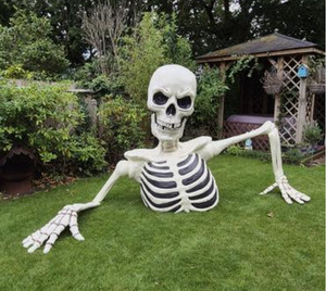 Esqueleto grande de Halloween al aire libre luz LED ojos sonido rompiendo tierra cráneo utilería