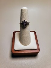 Silver 925 ring with purple lavender colored stone set in floral design. Size 6