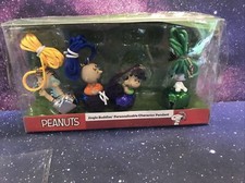 NIB SET OF 4 PEANUTS SNOOPY JINGLE BUDDIES JINGLE BELL PENDANTS NECKLACES