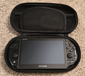 Sony PS Vita Slim PCH-2001 Touchscreen Console w/ Case, Charger & Uncharted Game