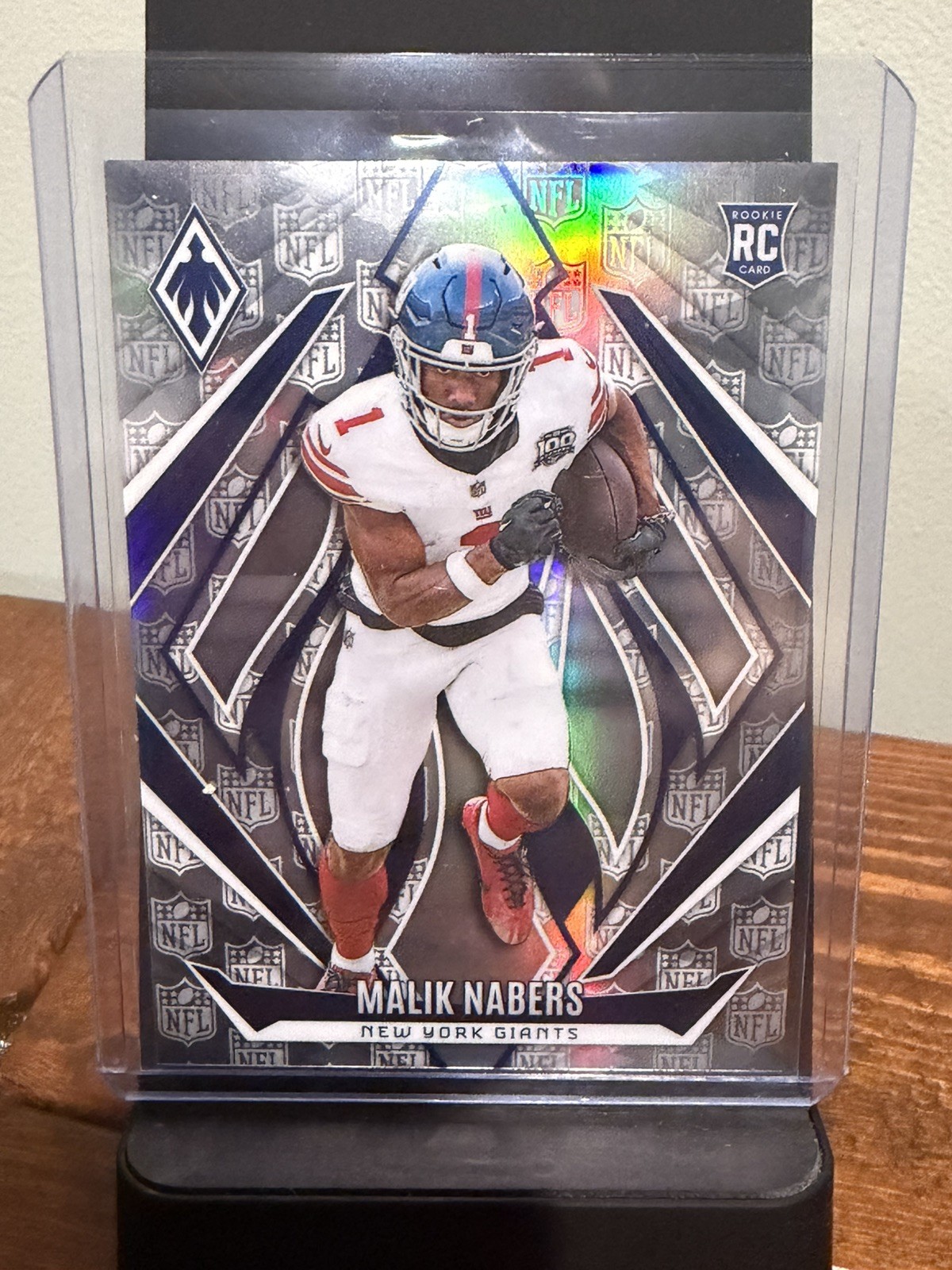 2024 Panini Phoenix - Rookies Malik Nabers #221 NFL Shield /150 (RC)