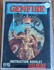 Gemfire SNES with protector, tray, manual, dust cover, and poster