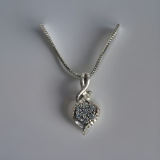 Zales 1/10 CT Enhanced Blue and White Diamond Cluster Twist Pendant in Sterling