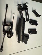 Kyosho Optima Mid 1987 Original Parts. Bumper-Wing Mount-Steering rack w/saver.