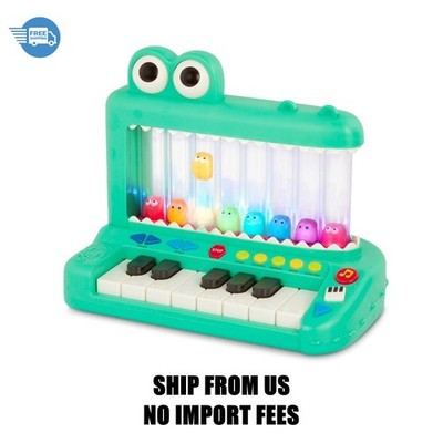 Battat Croco Pop Piano Toy Keyboard with Songs Sounds Lights, Baby and Toddler T