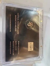 Vertical booklet magnetic one touch holder