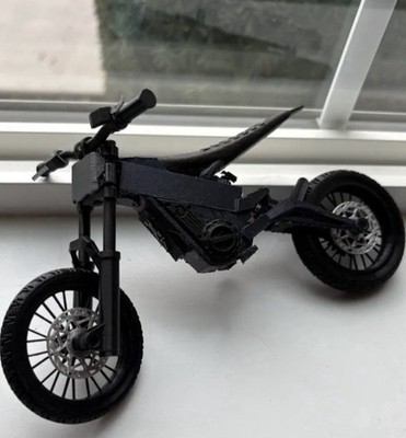 Black talaria xxx collectible mini with suspension on front and rear