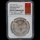 1991 $1 American Silver Eagle NGC MS69 Mint Error Struck Thru Bressett SIGNED