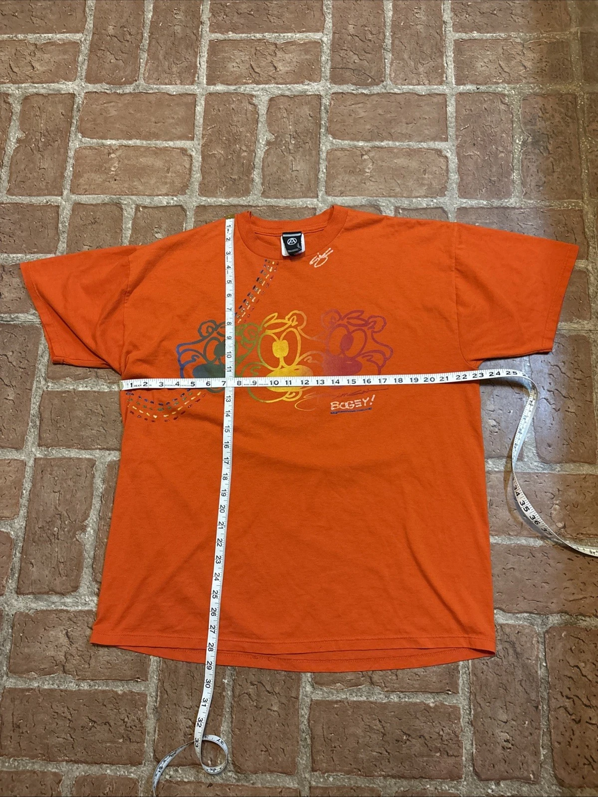 Aja Imani, 90’s Street Wear, XL, Bogey, Orange Tee, Unisex
Opens in a new window or tab