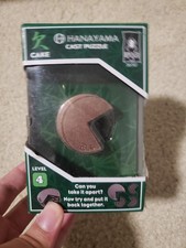  READ DESCRIPTION Hanayama Level 4 Cast Metal Brain Teaser Puzzle - Cake