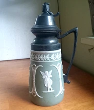 1880s GREEN RELIEF MOLDED CHERUBS PARIAN SYRUP PITCHER WITH PEWTER FLIP LID