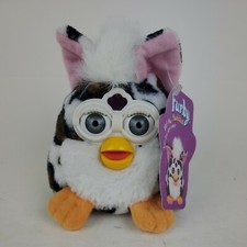 1999 Furby brand new, white w/black and brown with gray eyes. Name "Joke please"