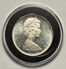 1965 Canadian Dollar coin 80% Silver - Nearly Uncirculated - w/coin capsule