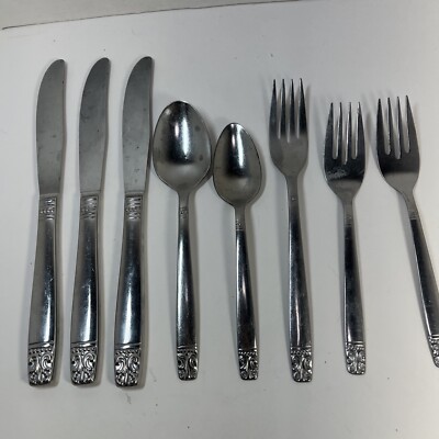 Set of 8 Oneida AZTEC ENCORE pattern stainless dinner  Wm Rogers