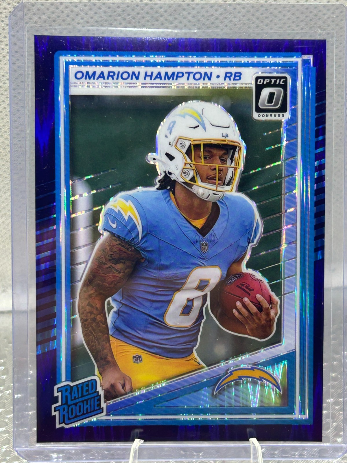 2025 Donruss Optic Omarion Hampton - Rated Rookie #212 Purple Shock Prizm