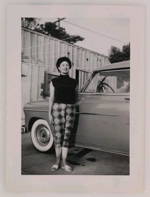 FOUND PHOTO Pretty Woman With Wild Geometric Pants Old Car Snapshot Vtg 1960