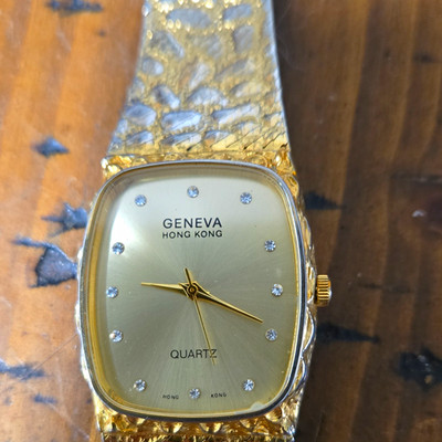 Geneva Hong Kong Quartz Gold-Tone Cushion Case Bracelet Sunburst Dial Watch