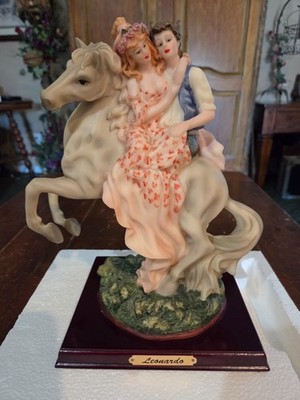 Leonardo Collection Boy w/Girl on Lap Riding Horse Figurine Wood Base