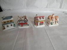 A dickens Christmas chalkware Christmas village houses & shops 4pc 1990