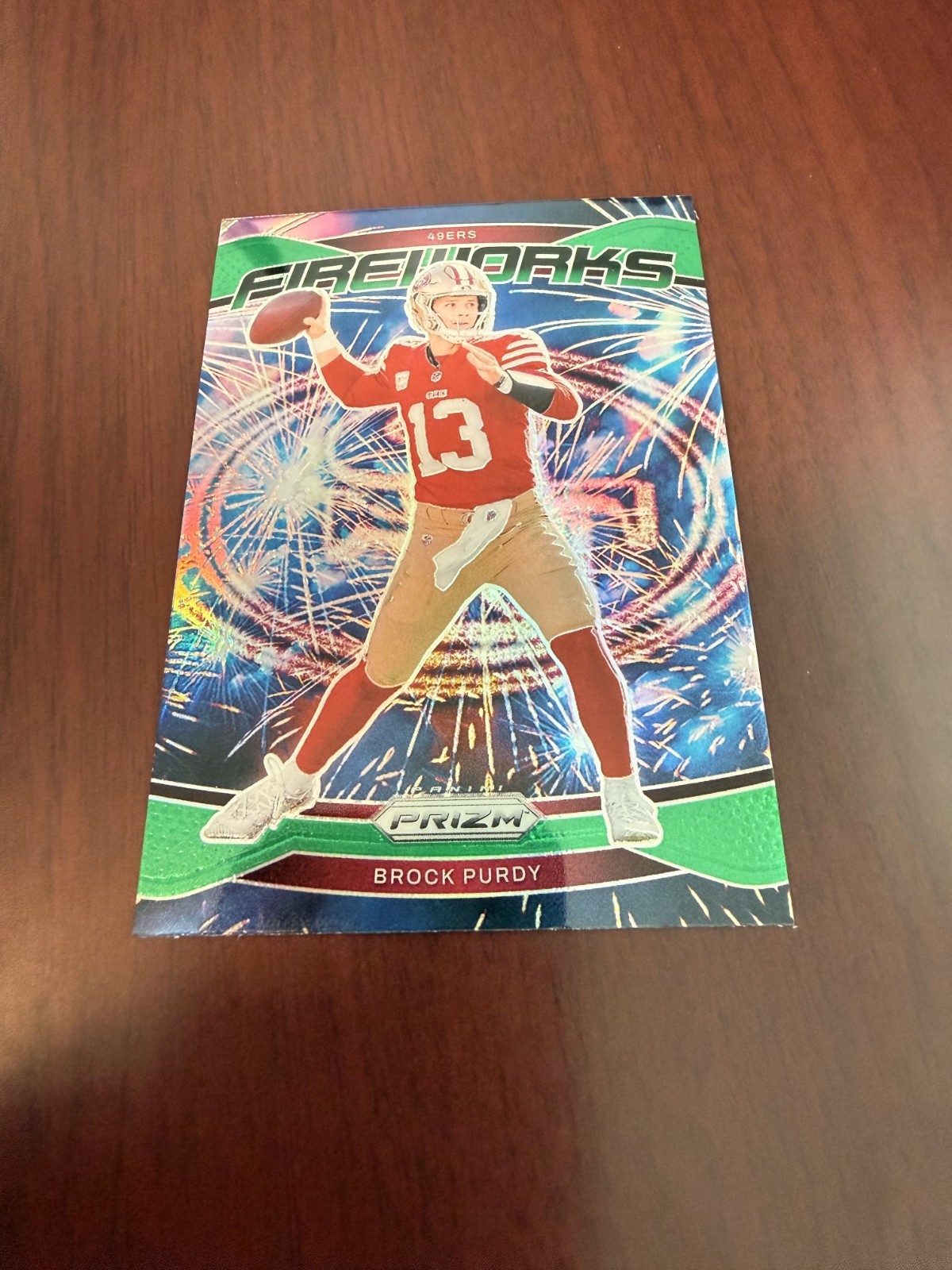2024 Panini Prizm Fireworks Green Prizm #2 Brock Purdy