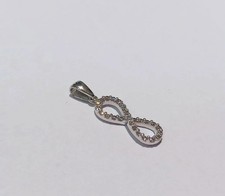 Ciondolo pendente infinito oro bianco 18 kt 750% con zirconi bianchi