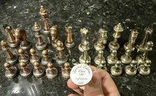 LIMITED EDITION 1 0F 8000 SET OF CHESS PIECES Brass/metal/silver Unknown Maker