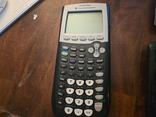 Texas Instruments TI 84 Plus Graphing Calculator Works great!