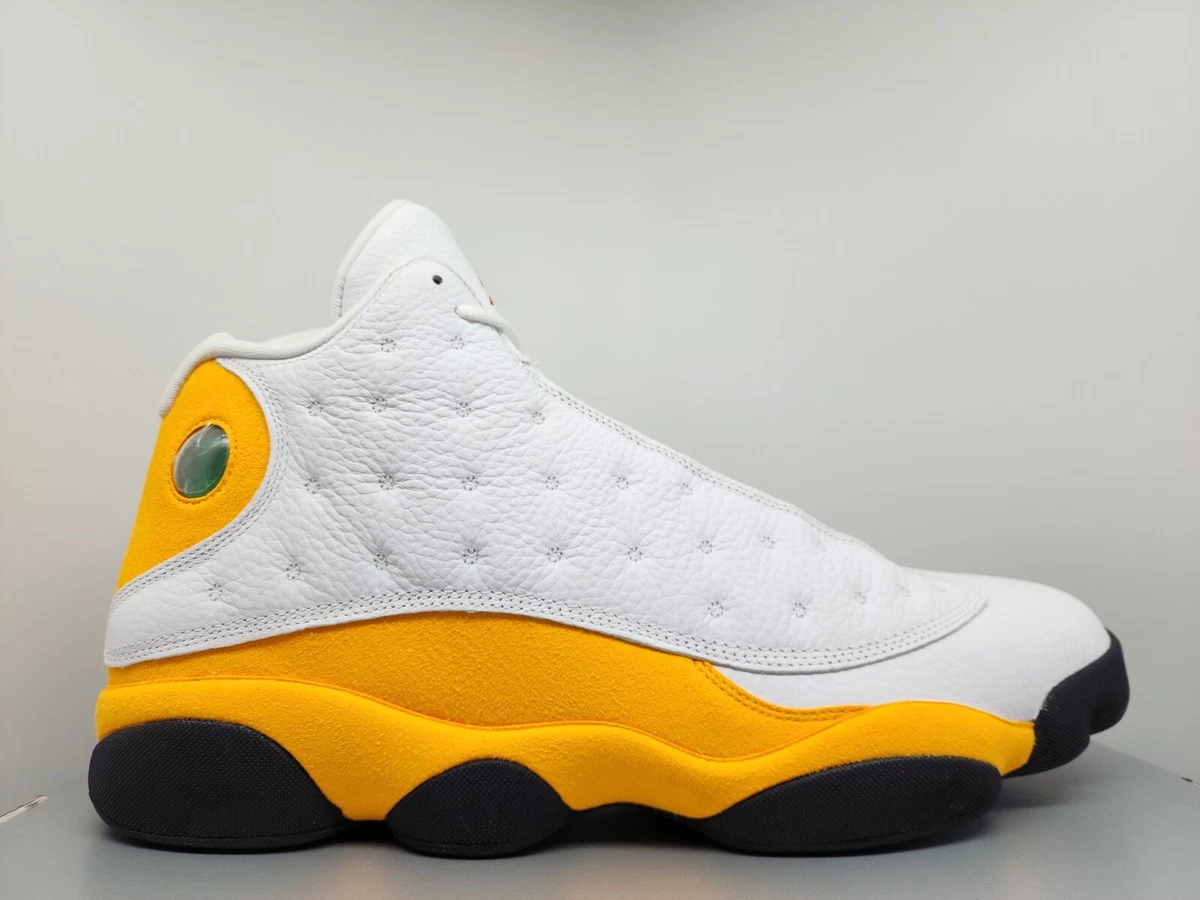 Yellow and white jordan 13 sales