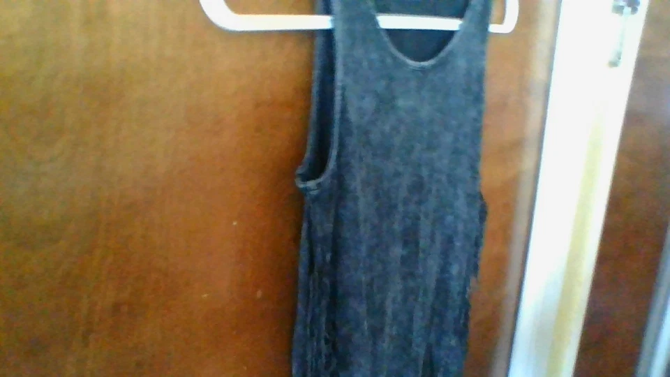 Camiseta sin mangas Xhilaration niñas talla M (7/8) negra con flecos laterales elástica Foto 2 de 4