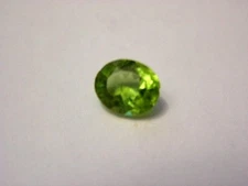 Peridot gemstone all natural India faceted 9x7mm oval
