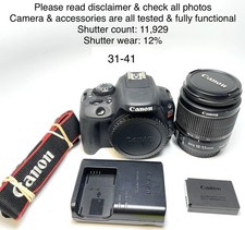Canon SL1 18.0MP DSLR w/18-55mm IS Lens In Very Good Condition Shutter 11,929.