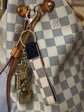 Authentic Louis Vuitton Lock and Key Set with Unbranded Bag Charm