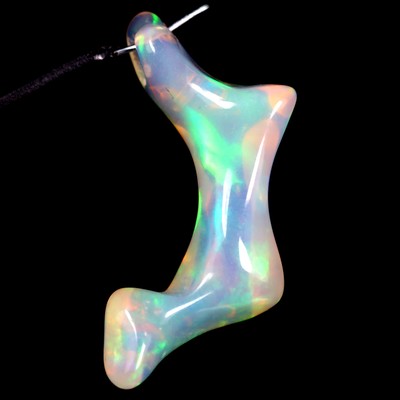 6.11 ct  Fancy Cut With Hole (26 x 7mm) Natural Ethiopian Flashing Rainbow Opal